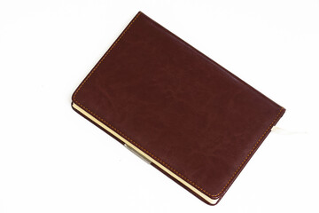 New brown leather notebook isolated on white
