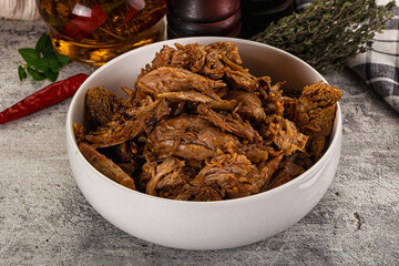 Shredded slow cooked pork meat