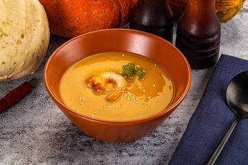 Pumpkin cream soup with prawns