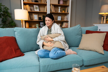 Stomach ache, cramps and hands of woman with abdomen pain due to constipation, menstruation or ibs...