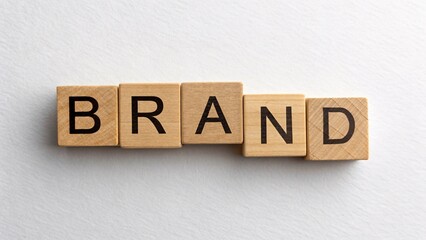 Wooden alphabet blocks arranged to spell a brand name highlighting the intersection of creativity and business identity in branding strategies.
