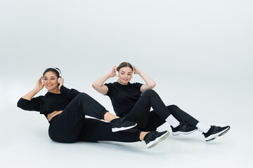 Empowered women engaging in fitness activities during a dynamic workout session