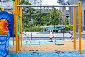 Colorful Playground with Slides and Swings in Park