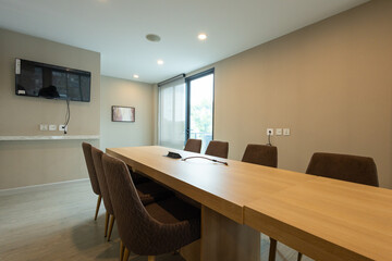 Modern Conference Room with Long Table and Chairs