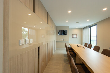 Modern Conference Room with Long Table and Chairs