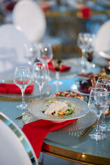 Light blue aesthetic table setting in the restaurant in the evening