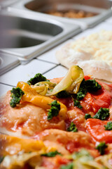 Close-up of cooking vegetarian pizza
