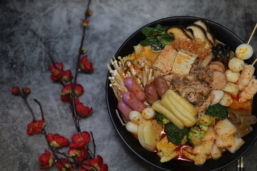 mala tang, spicy soup, sichuan cuisine, hot pot, chinese food, savory broth, flavorful soup, street food, original image, spicy food, asian food, chinese cuisine, popular dish, dining out