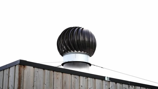 Industrial rooftop ventilation system in circular shape. Modern metal structure for airflow and building cooling, shot from above in daylight. Ideal for architecture and engineering themes.

