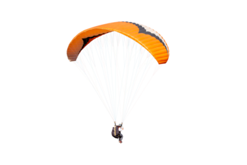 The sportsman flying on a paraglider. Beautiful paraglider in flight on a white background.	