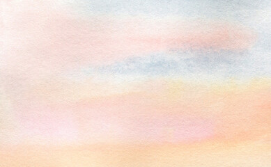 Hand-drawn watercolor texture background, gradient from yellow to pink colors. For sunset skies, decoration and design. Long horizontal border.