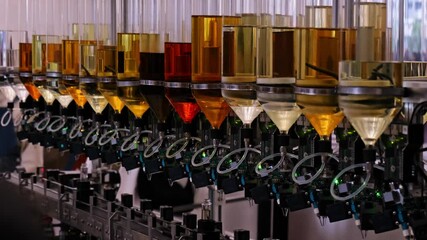Automated perfume production system in the future. Glass flasks. Perfume factory. Cutting-edge automated production. Modern perfume factory with glass flasks and interconnected tubes