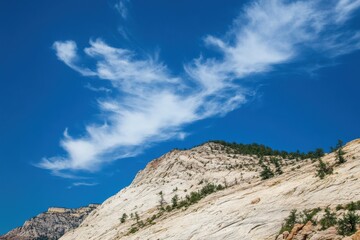 Scenic Mountain Landscape with Striking Clouds and Blue Sky