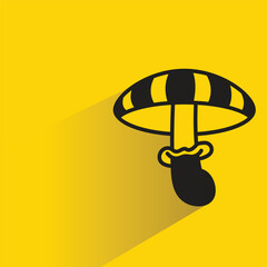 mushroom icon with drop shadow on yellow background