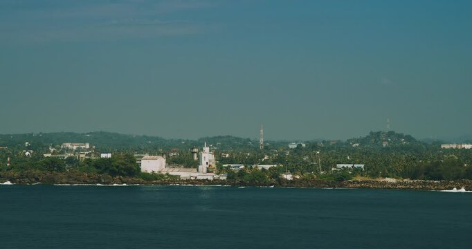 Galle cityscape, Sri Lanka. Laccadive sea and horizon view coast near city. Sea street, Marine walk and Insee Cement - Galle Cement Works.