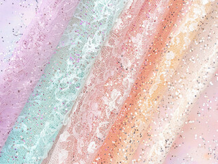 Fototapeta premium collection of elegant, feminine lace fabrics in pastel colors with sparkling sequins, creating seamless and delicate background