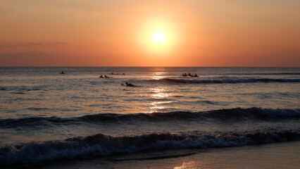 Sunset golden hour at Kuta Beach on Bali Island, Indonesia