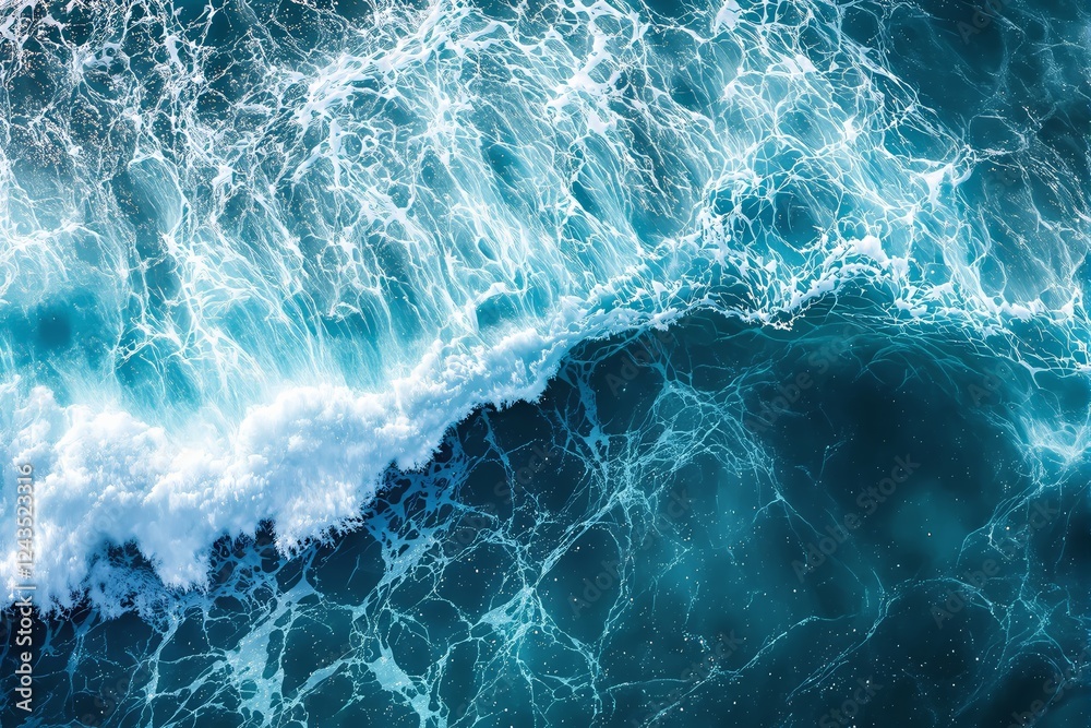 Poster Ocean waves crashing with foam and light reflections, creating a mesmerizing pattern on the dark blue sea background.