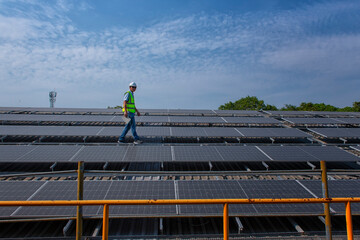 portrait of a worker on solar cell and sustainable green energy.