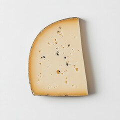 Slice of Swiss cheese showing characteristic holes and pale color on neutral background