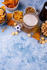 Fototapeta premium Beer and different snacks for Superbowl or football party