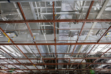 High scaffolding structure under construction beams