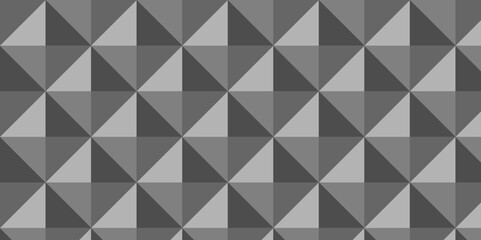 Fototapeta premium seamless geometric pattern black and gray color cube fabric. closeup square mosaic wall tiles vintage triangle cubic texture design.