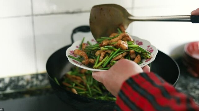 Stir-fried meat with garlic moss