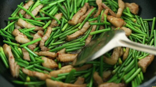 Stir-fried meat with garlic moss