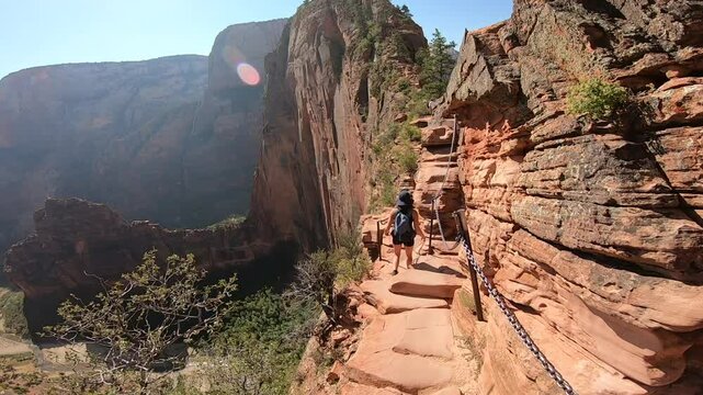Panoramic view of Zion National Park featuring the Angels Landing hiking trail with breathtaking cliffs and deep canyons.
