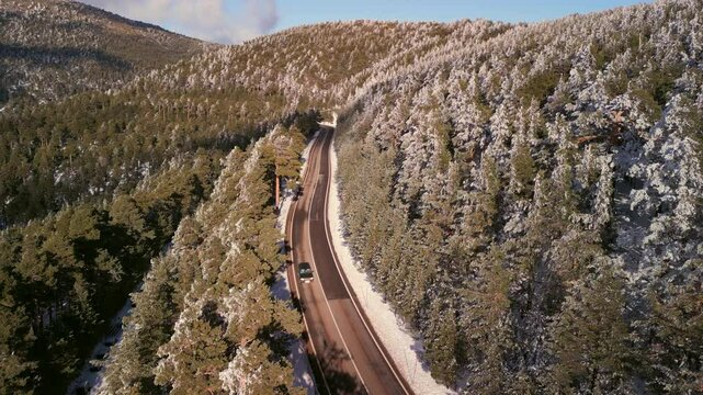 Car passsing by a mountain road in Navacerrada
