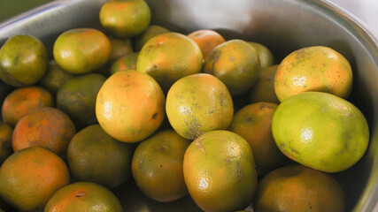 fresh citrus fruits as background, top view