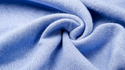 Fototapeta premium Soft blue fabric swirling, showcasing texture and detail for design inspiration or textile analysis