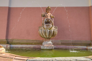 Brunnen, Putte reitet auf Delfin, Schloß Weilburg, Landkreis Limburg-Weilburg, Hessen, Deutschland © Frank