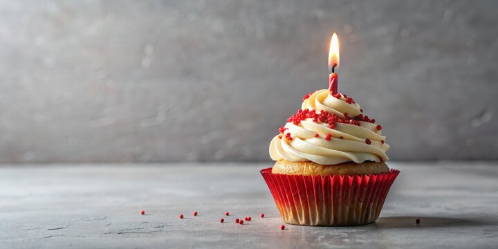 Single Birthday Cupcake Red Sprinkles, Lit Candle, Grey Background