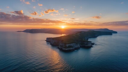 Aerial View of Scenic Promontory at Sunset Over Calm Waters with Space for Text and Copy on Clear Sky Background