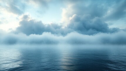 Fototapeta premium misty morning mist blankets the calm ocean under a cloudy sky background