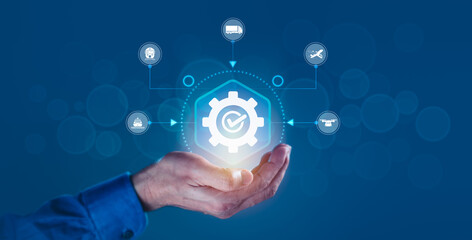 Man Cradling Gear with Supply Chain Icons for Logistics and Transportation