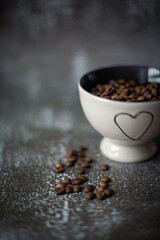 a cup of coffee beans on the table