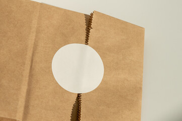 Blank Label on Brown Paper Bag on Table
