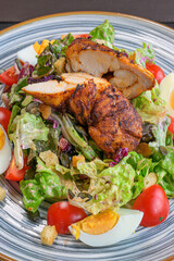 roasted chicken teriyaki on fresh salad