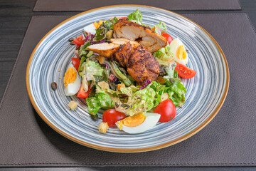 roasted chicken teriyaki on fresh salad