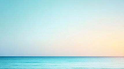 Obraz premium A serene watercolor background featuring a smooth gradient transitioning from deep ocean blue at the top to a soft, airy white at the bottom. The delicate brush strokes create a flowing texture,