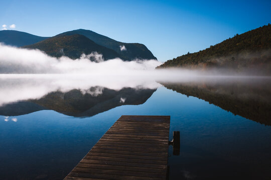 Dock on lake with morning mist and fog, Baxter State Park, Maine