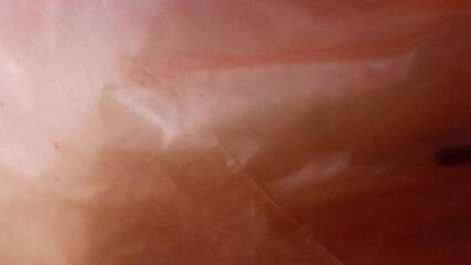 Fototapeta premium An abstract exploration of form and light, captured in the unique texture of plastic. This background offers a dynamic and intriguing visual for your designs.