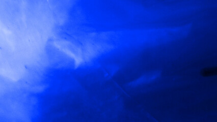 An abstract exploration of form and light, captured in the unique texture of plastic. This background offers a dynamic and intriguing visual for your designs.