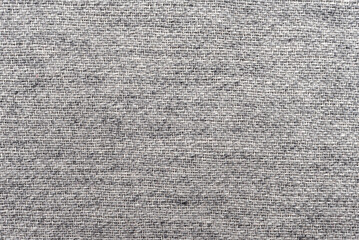 Texture of dense black fabric for tailoring. Canvas. Textile. Material