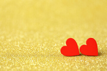 Red decorative hearts on shiny golden background, space for text. Happy Valentine's day
