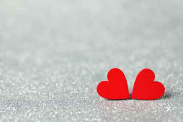 Red decorative hearts on shiny silver background, space for text. Happy Valentine's day