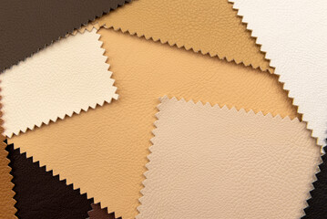 Palette of multi-colored pieces of genuine leather. Accessories for sewing. Leather material